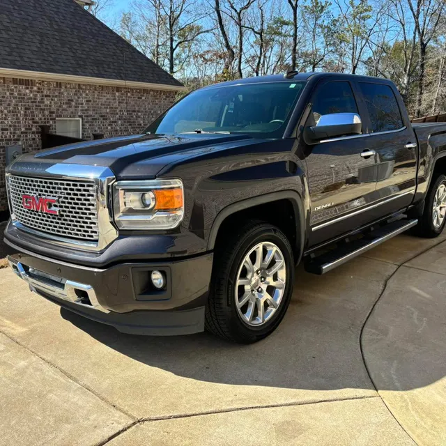 Freshly detailed dark GMC truck